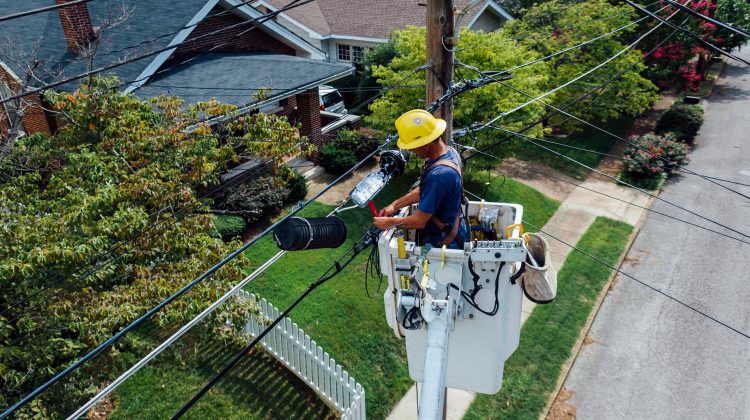 man working on electrical wires